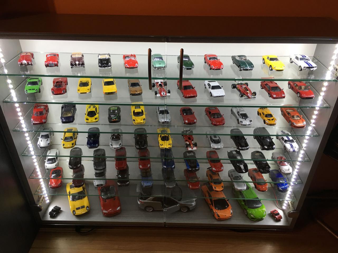 An automobile company displays a diecast model